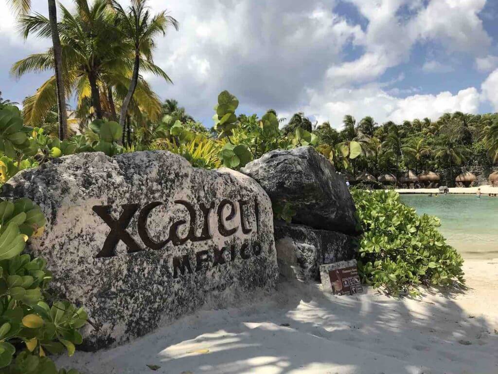 xcaret park sign at the beach