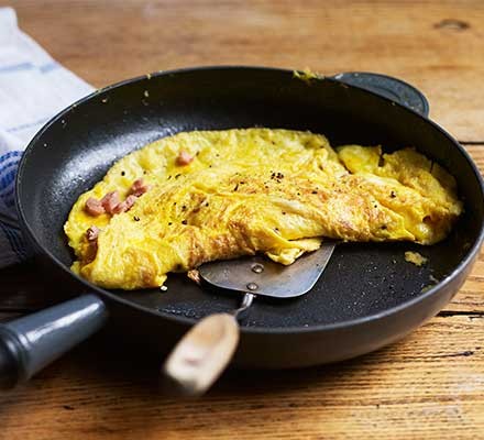 A frying pan serving an omelette