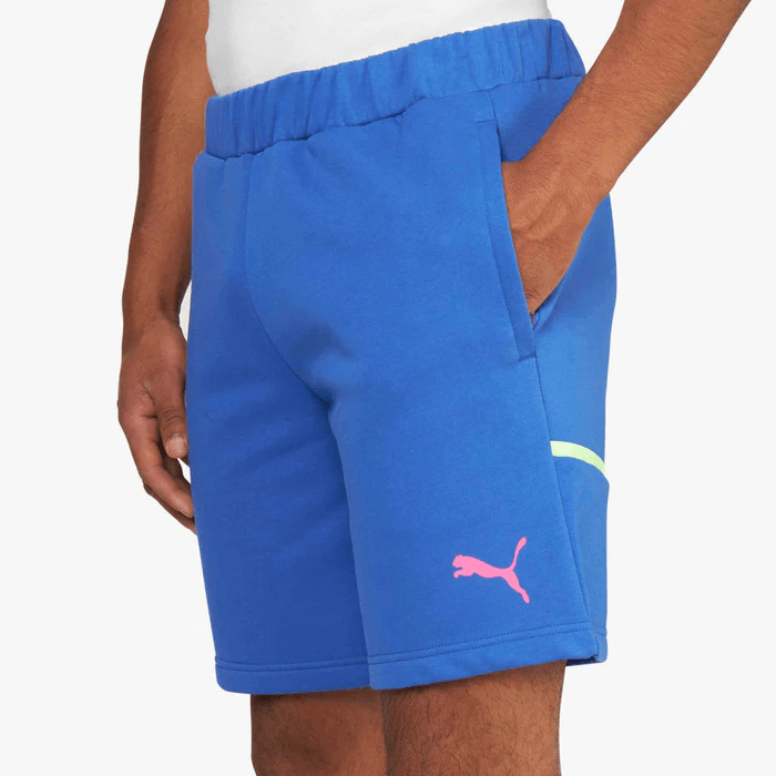 A person wearing blue shorts

Description automatically generated