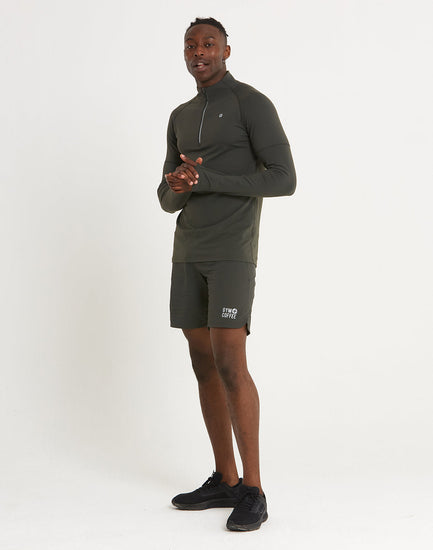 https://cdn.shopify.com/s/files/1/0492/7828/8032/products/2-ECOM-SS22-EVOLUTION-SHORTS-KHAKI-2_550x550.jpg?v=1652438218