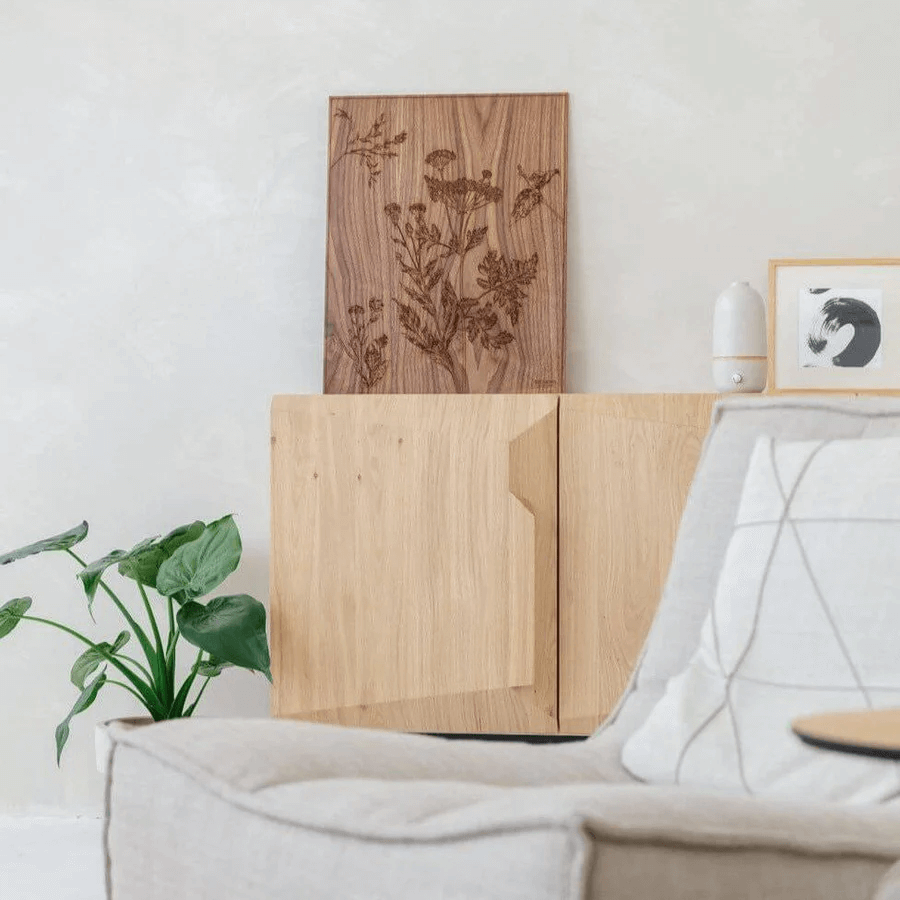 A couch with a wood piece on the wall Description automatically generated with medium confidence