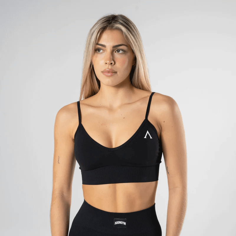 A person in a black sports garment Description automatically generated