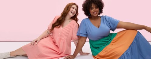 two women sitting happily