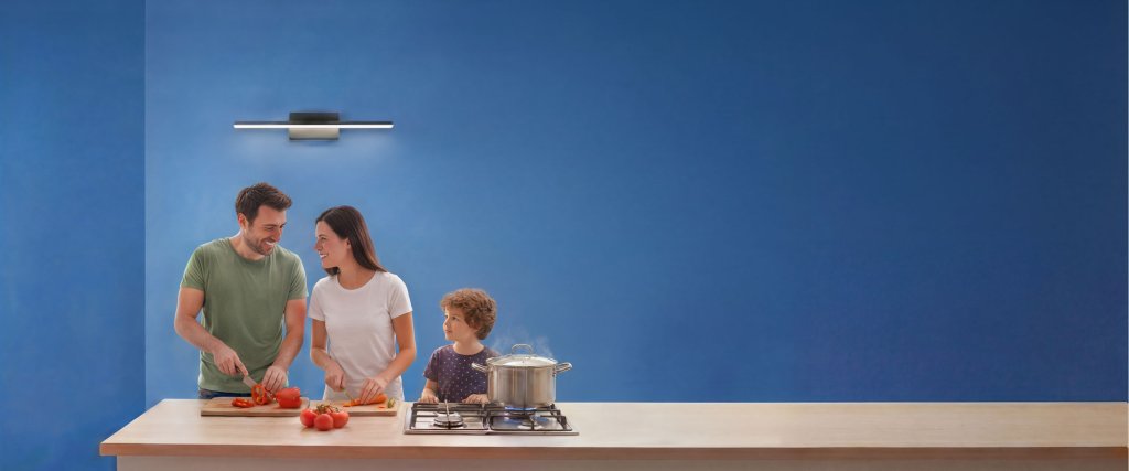 Family cooking together in a bright kitchen, from the A2A Start energy offer campaign