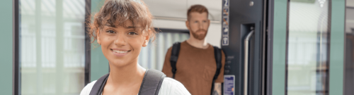 Deutschlandticket travellers at a German train station