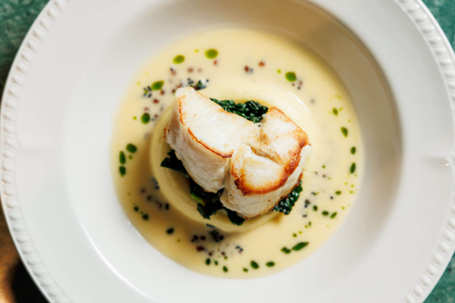 A seasonal fish dish served at Songbird Restaurant and Bar