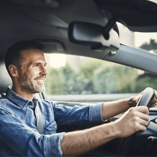 Man driving a Hertz rental car in Mexico