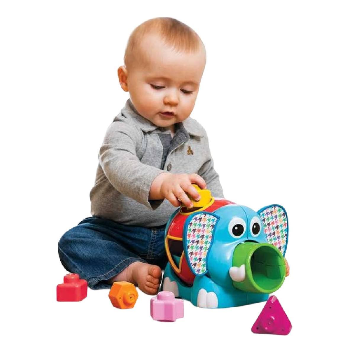Baby playing with a colourful elephant shape sorter toy