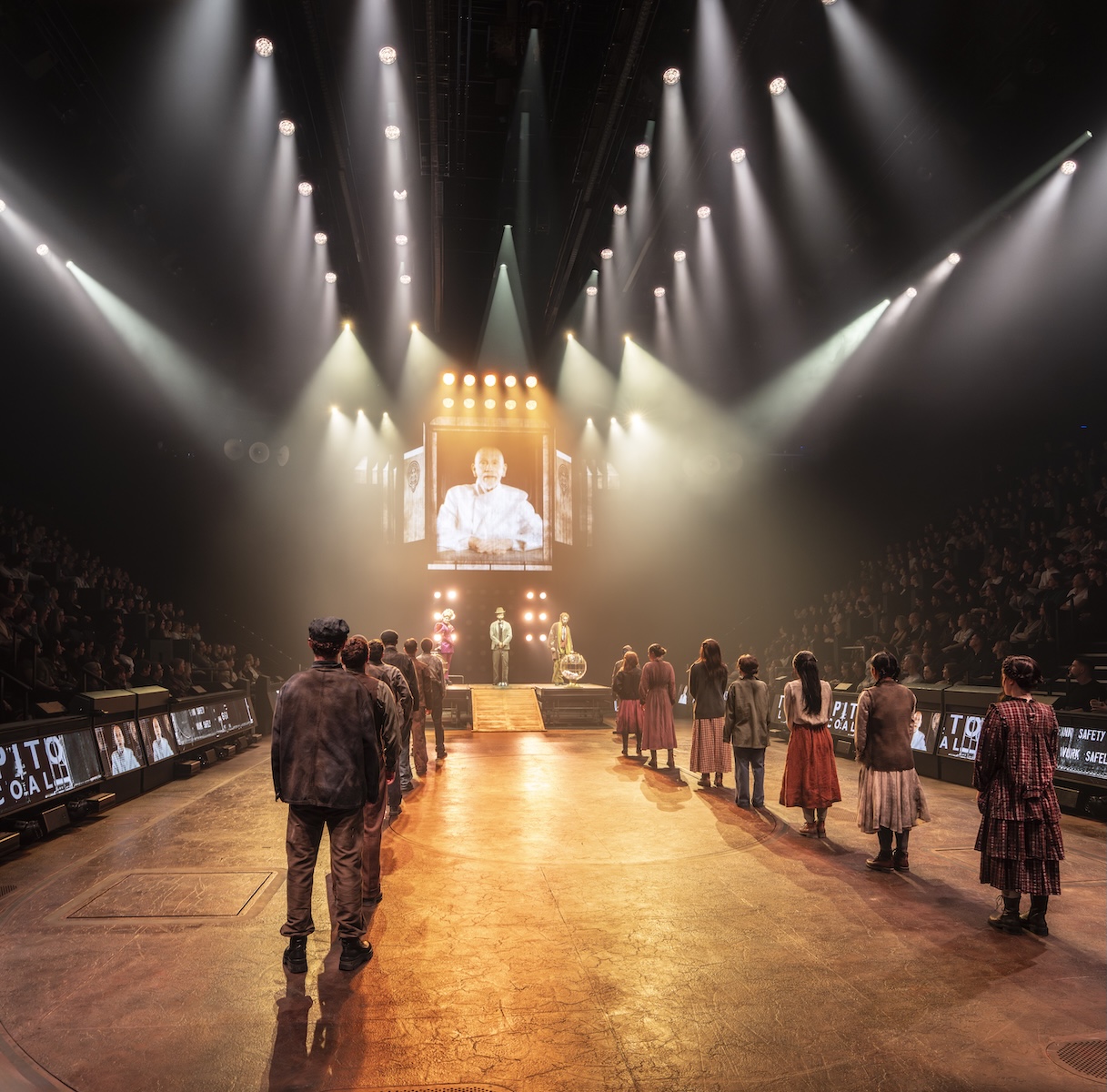 Tributes parade through the arena in The Hunger Games: On Stage