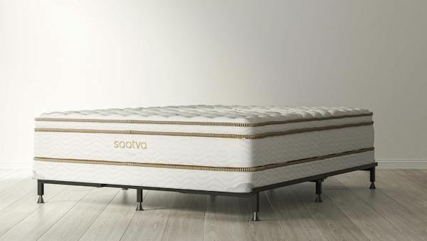 Saatva foundation under a Saatva Classic mattress on a metal frame