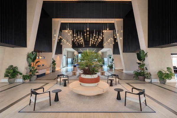Hotel lobby with plants and seating at Four Points by Sheraton Costa Blanca